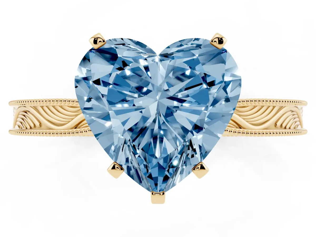 Fancy Blue Heart Cut Solitaire Milgrain Engraved Band with Four-Prong Setting Yellow gold