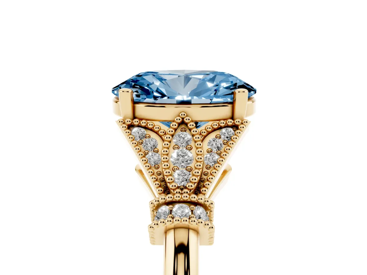 Fancy Blue Oval Cut Diamond Solitaire Ring with Floral Filigree and Pave Accents Yellow gold
