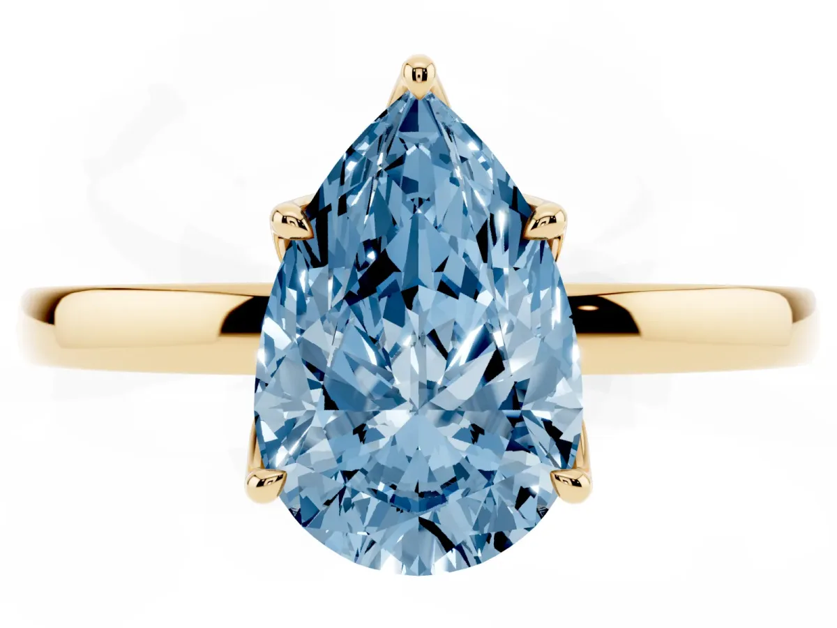 Fancy Blue Pear Cut Diamond Solitaire Ring with Thin Band and Prong Setting Yellow gold