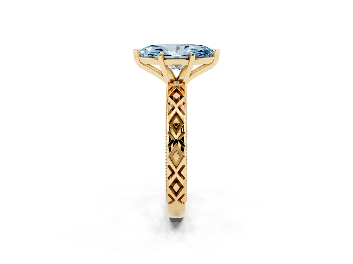 Fancy Blue Marquise Cut Solitaire Diamond Ring with Milgrain and Black Enamel X Pattern Band Yellow gold