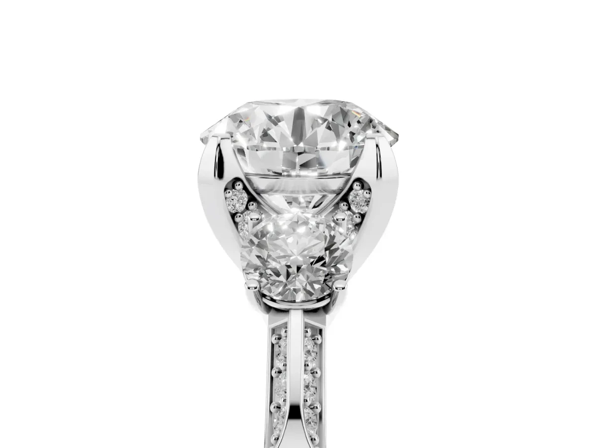 Round Cut Brilliant Three-Stone Diamond Ring with Pavé Band and Four-Prong Setting Silver