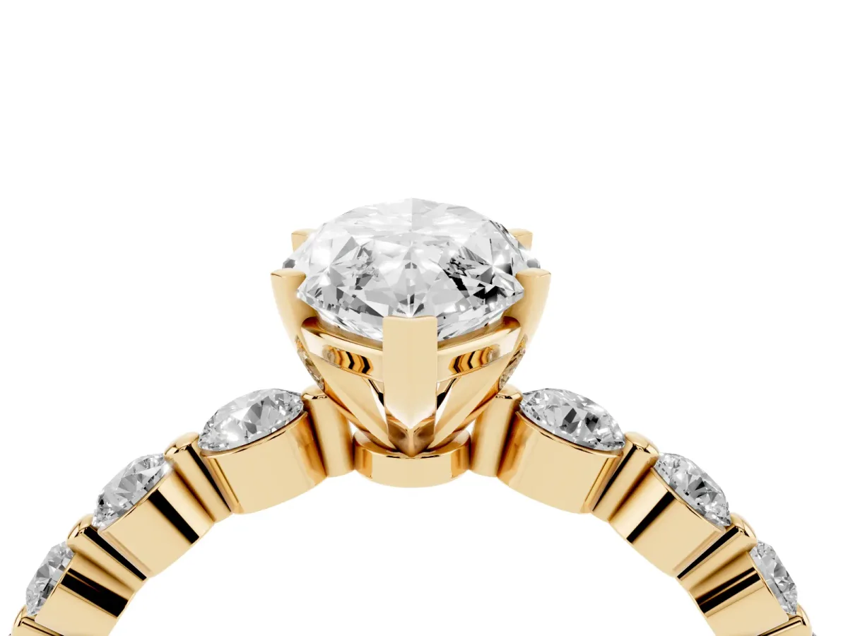 Marquise Cut Solitaire Diamond Ring with Pave Band and Four-Prong Setting Yellow gold