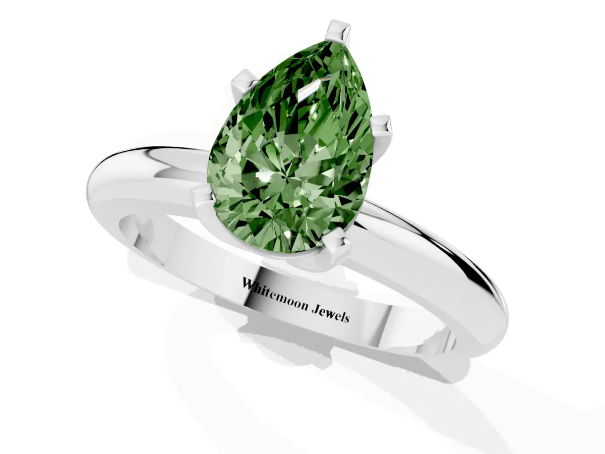 Fancy Green Pear Cut Diamond Solitaire Engagement Ring with Round Band and Four-Prong Setting Platinum