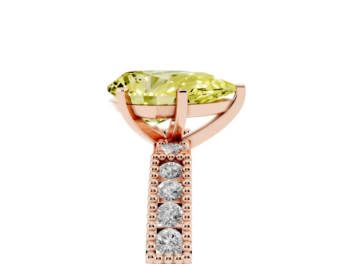Fancy Yellow Pear Cut Solitaire with Pavé Band and Four-Prong Setting Rose gold