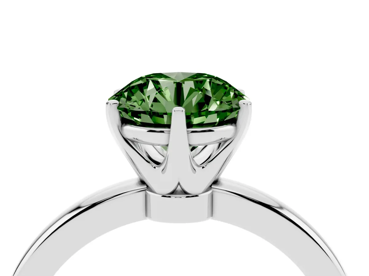 Fancy Green Round Cut Solitaire Diamond Ring with Six-Prong Setting on a Classic Band Silver