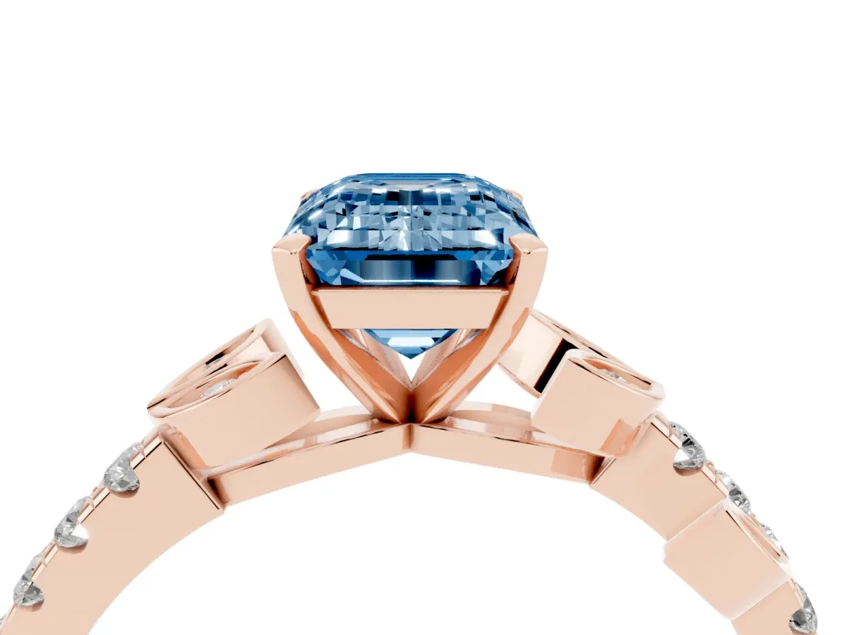 Fancy Blue Emerald Cut Solitaire Leaf-Inspired Diamond Ring with Pavé Band and Four-Prong Setting Rose gold