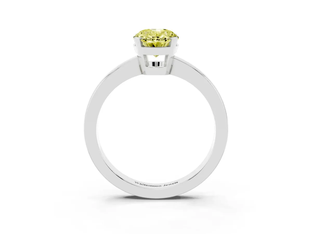 Fancy Yellow Oval Cut Cut Solitaire Ring with Four-Prong Setting and Classic Band Silver