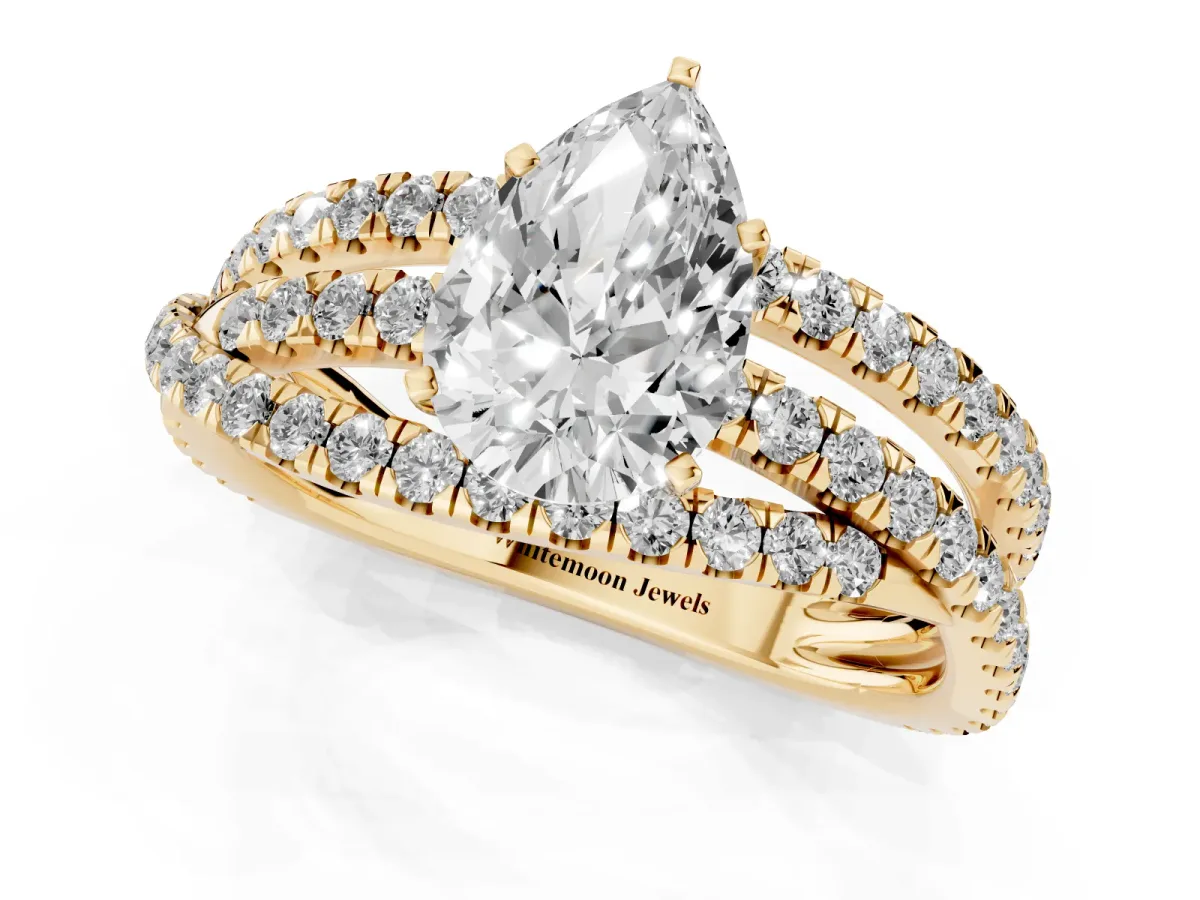 Pear Cut Solitaire Twist Band with Pavé Setting and Four-Prong Setting Yellow gold