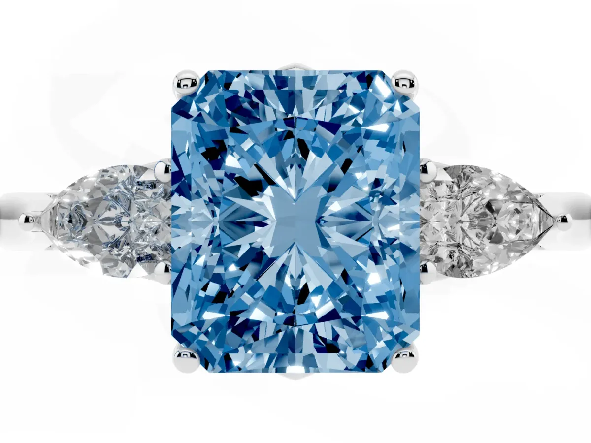 Fancy Blue Three-Stone Radiant Cut Brilliant Diamond Solitaire Ring with Tapered Band and Four-Prong Setting Platinum