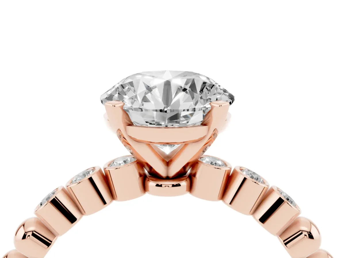Round Cut Solitaire Bezel Accent Diamond Engagement Ring with Beaded Band and Four-Prong Setting Rose gold