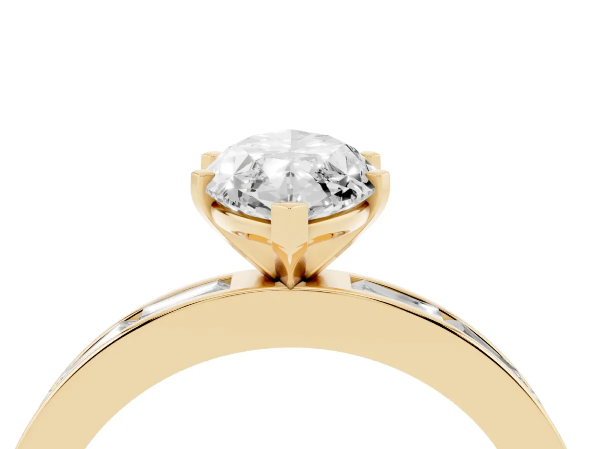 Marquise Cut Solitaire Diamond Ring with Channel-Set Baguette Band and Four-Prong Setting Yellow gold