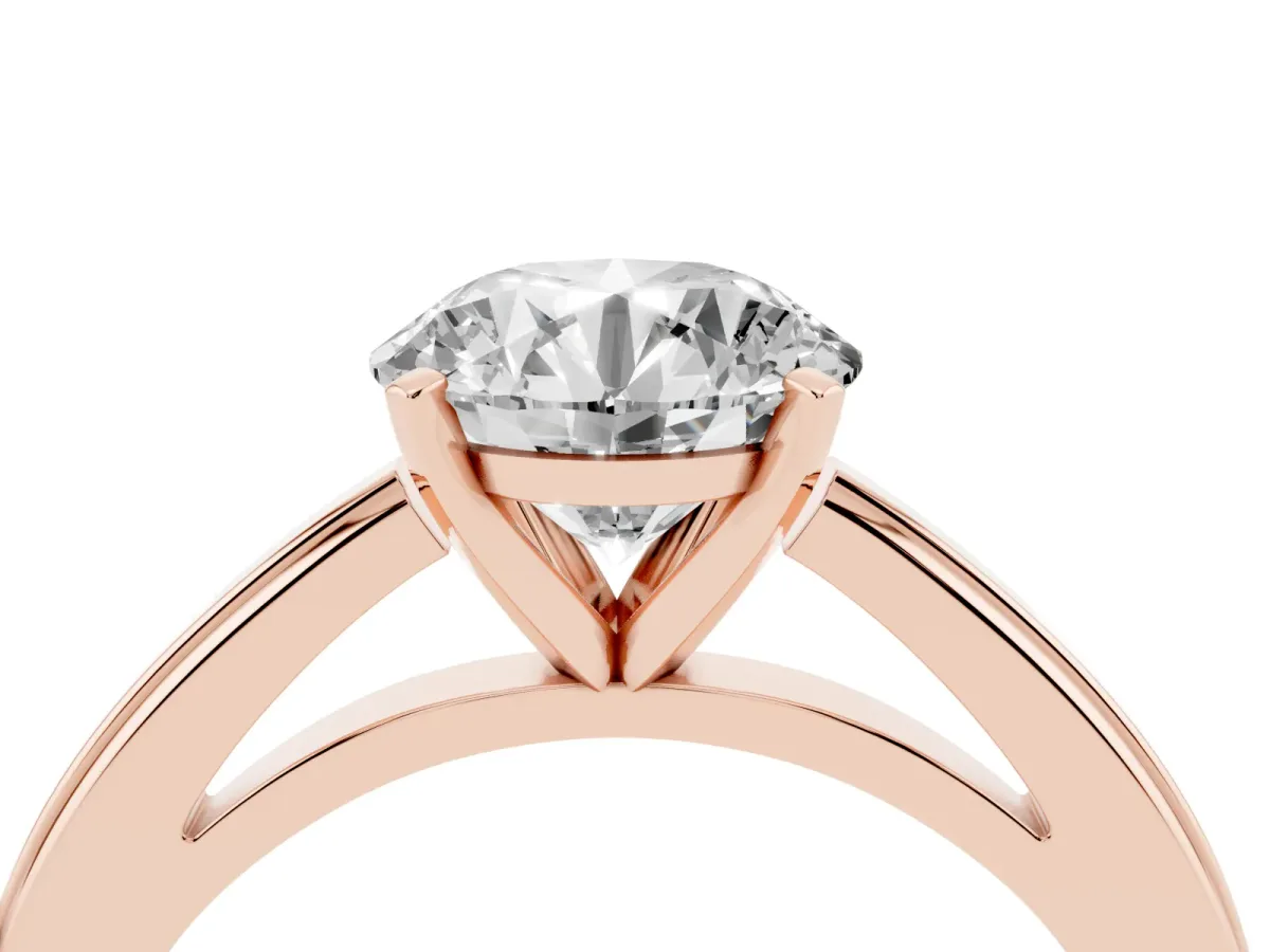 Round Cut Solitaire Diamond Ring with Four-Prong Setting and Classic Band Rose gold