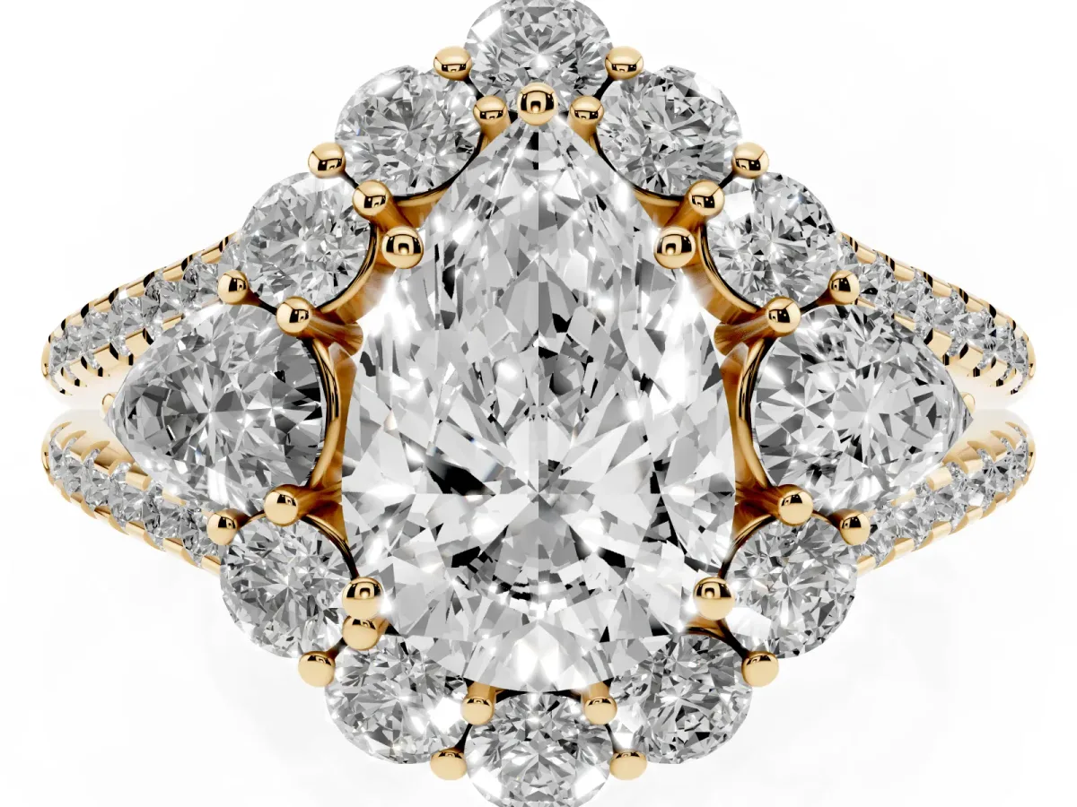 Pear Cut Halo Split Shank Diamond Engagement Ring with Prong Setting Yellow gold