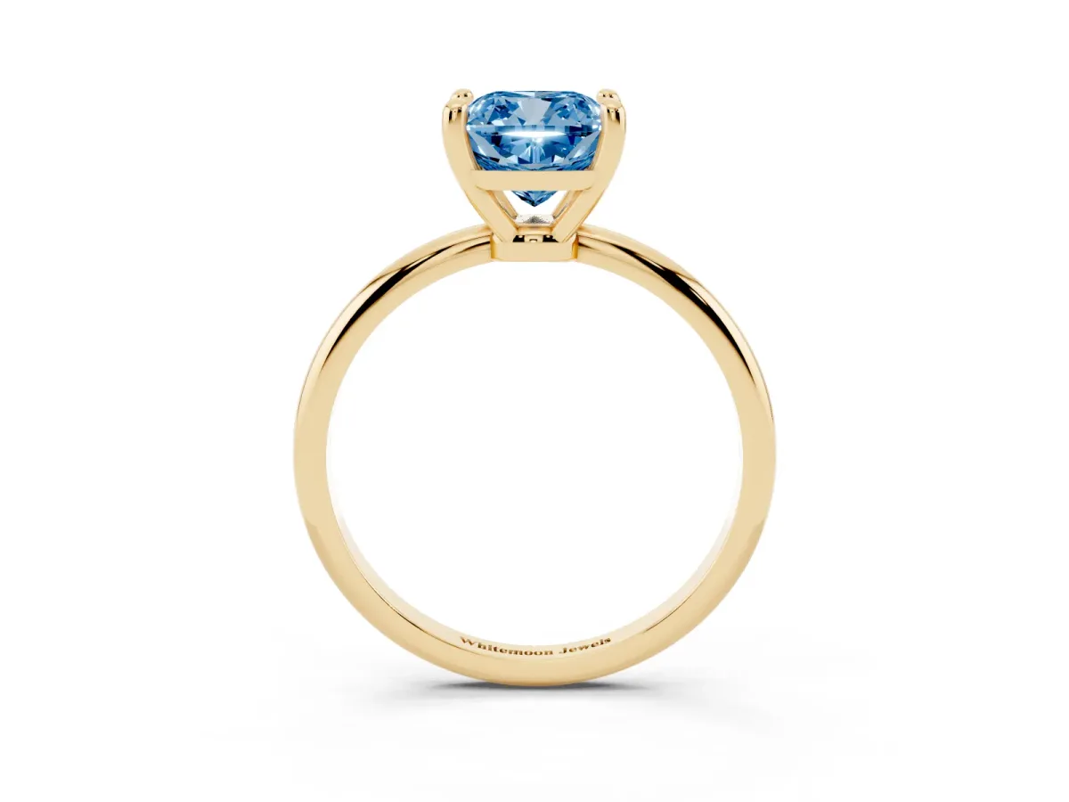 Fancy Blue Cushion Cut Solitaire Diamond Ring with 4-Prong Setting on a Classic Band Yellow gold