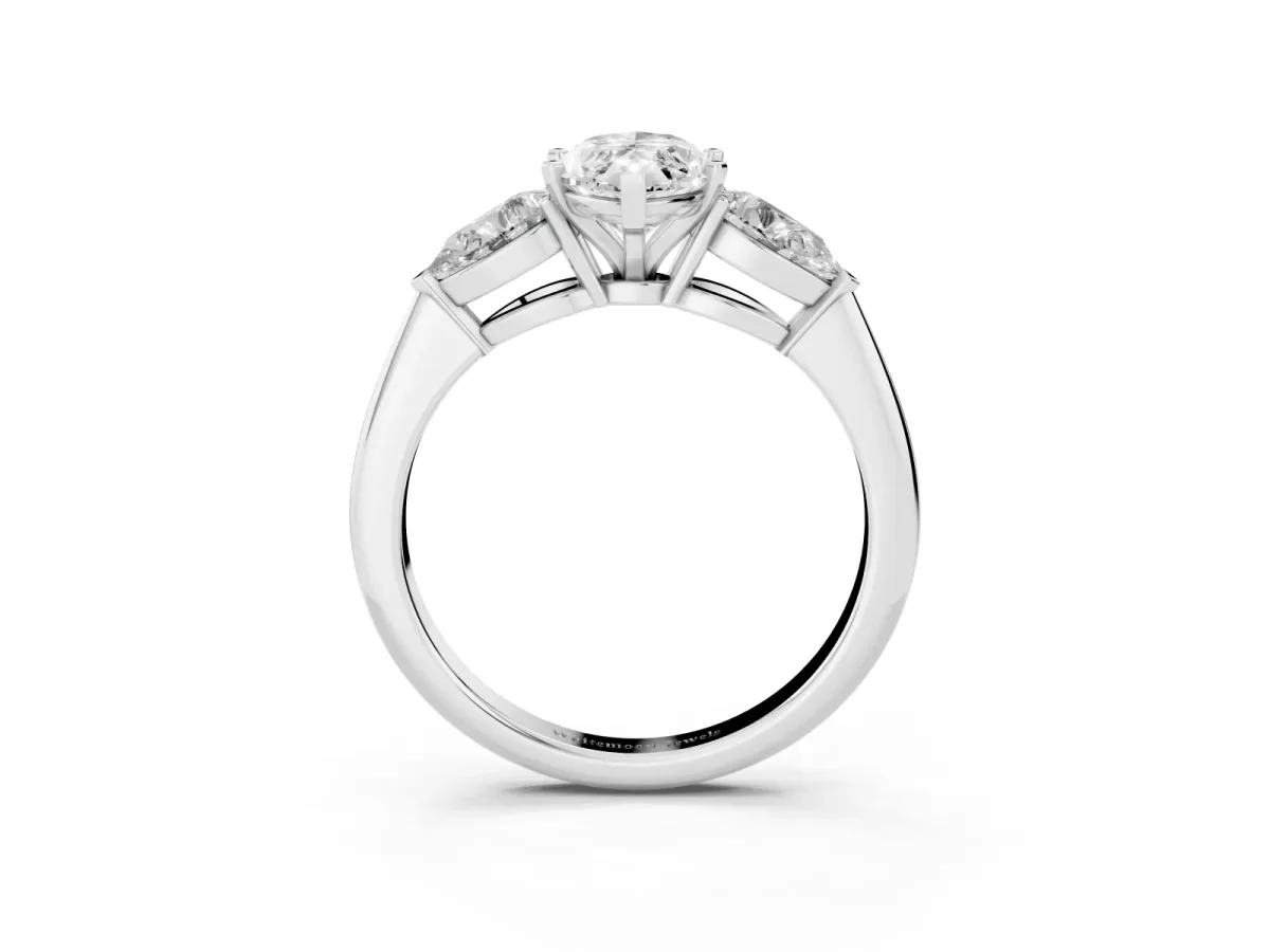 Three-Stone Marquise Cut Diamond Ring with Pear Side Stones and Four-Prong Setting Silver