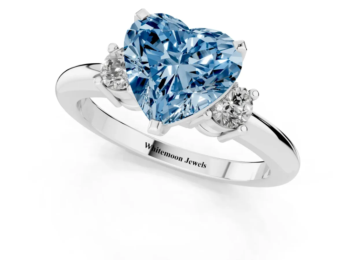 Fancy Blue Three-Stone Heart Cut Cut Diamond Solitaire with Prong Setting and Classic Band Silver