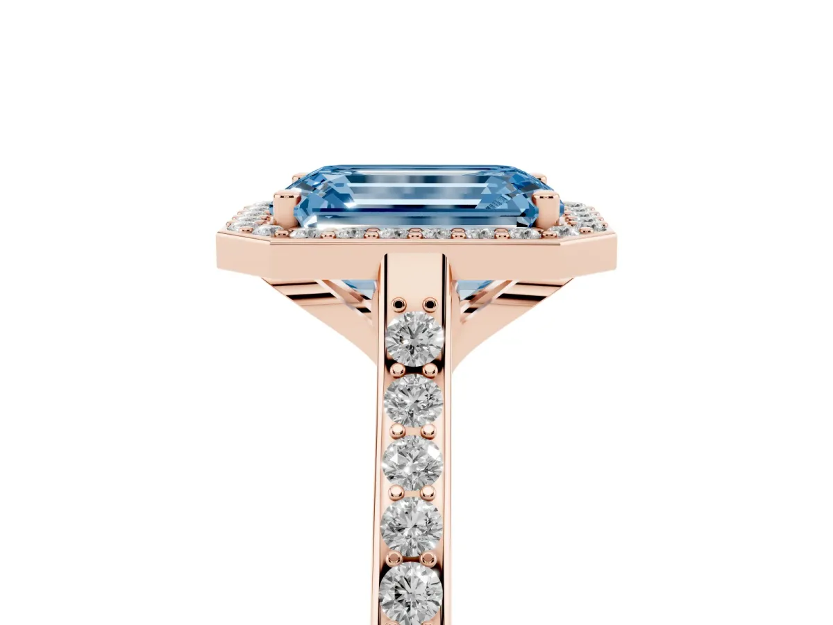 Fancy Blue Emerald Cut Diamond Halo Engagement Ring with Round Pavé Shoulders and Prong Setting Rose gold