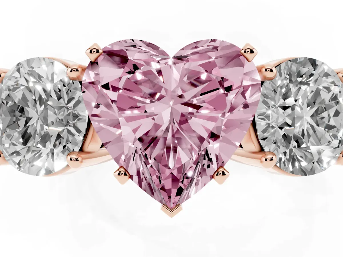 Fancy Pink Three-Stone Heart Cut Diamond Ring with Round Side Stones, Classic Band, and Four-Prong Setting Rose gold