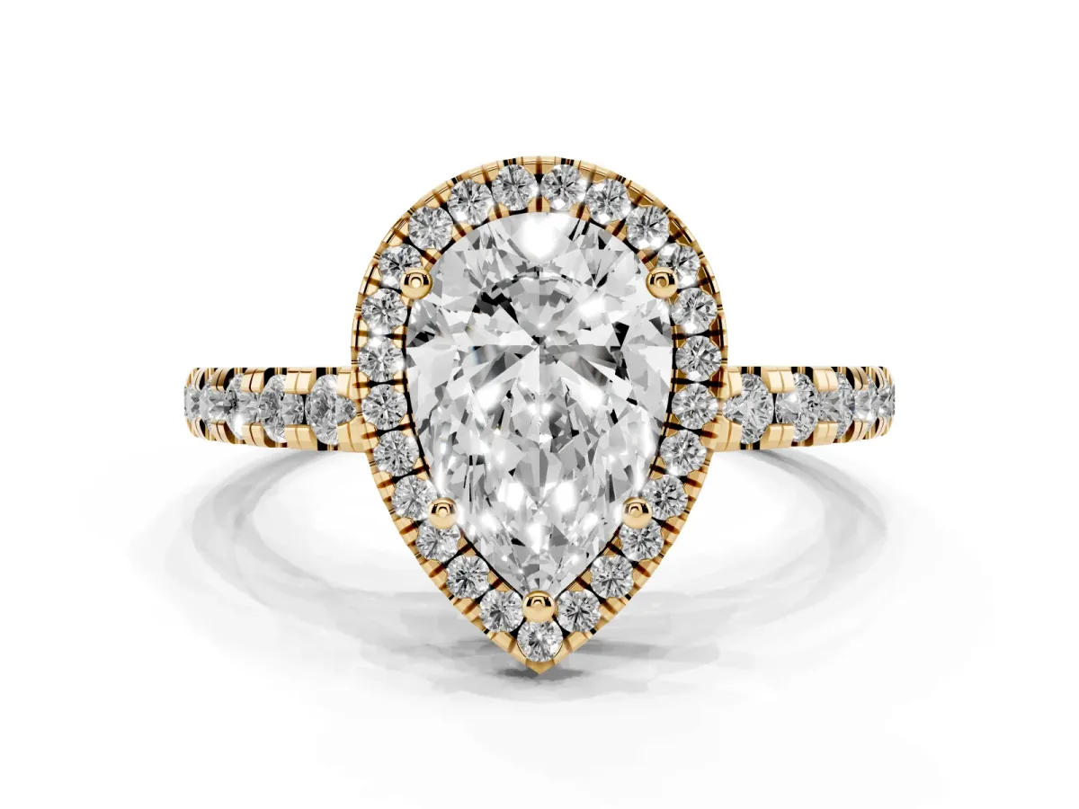 Pear Cut Diamond Halo Ring with Pavé Band and Four-Prong Setting Yellow gold
