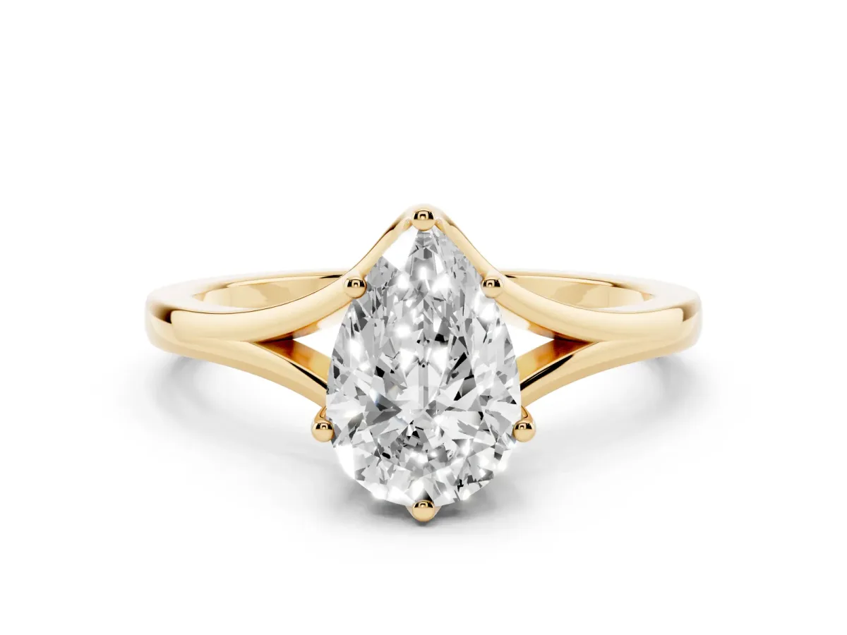 Pear Cut Solitaire Diamond Ring with Six-Prong Setting and Tapered Band Yellow gold