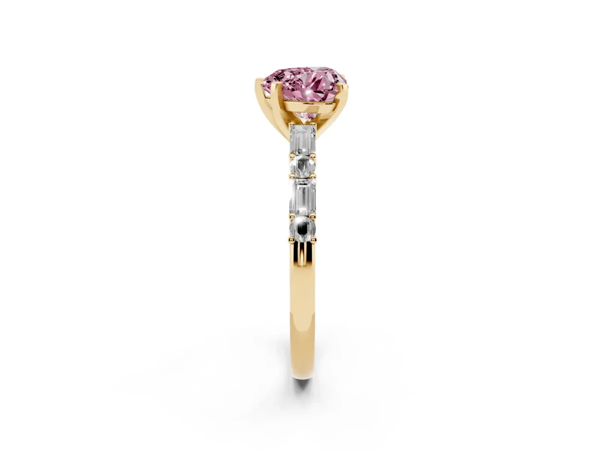 Fancy Pink Heart Cut Diamond Solitaire with Side Baguettes and Channel Set Band Yellow gold