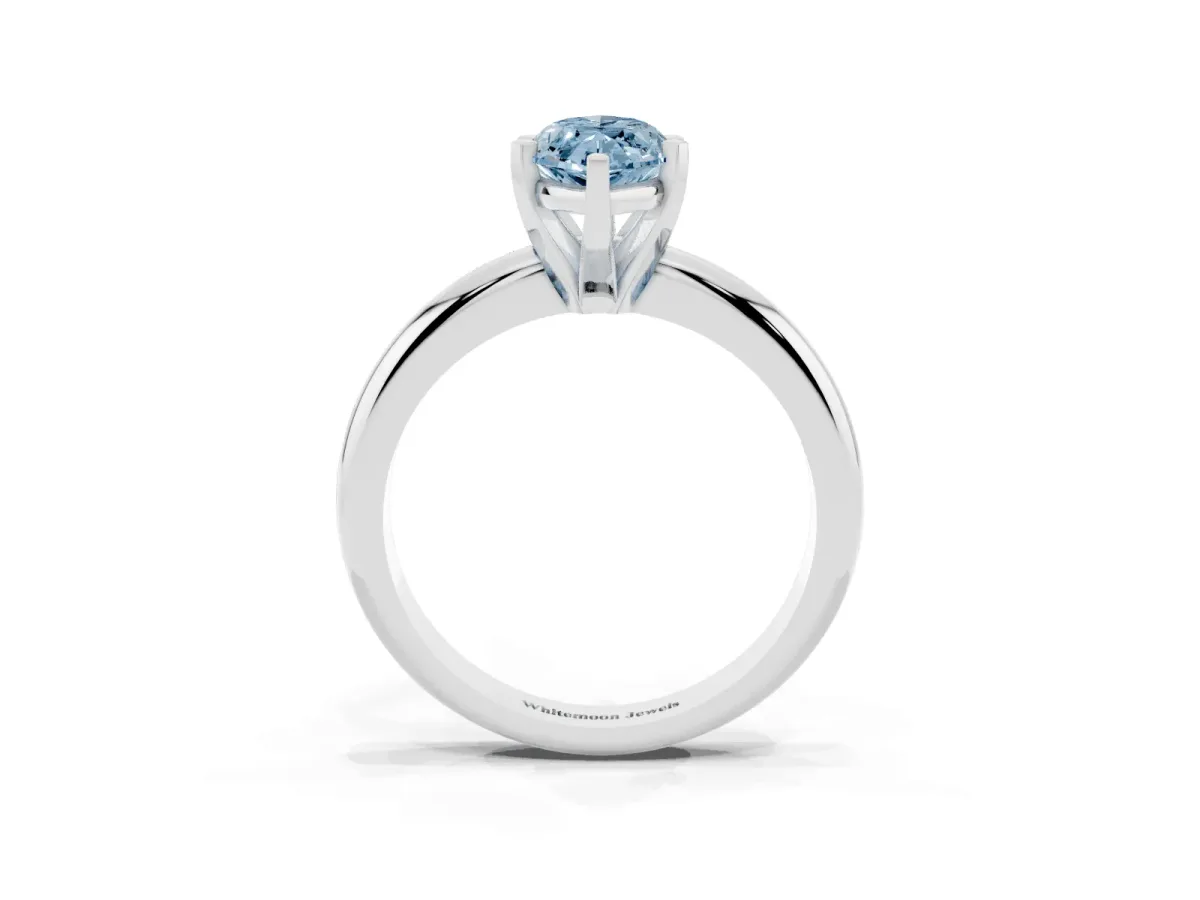 Fancy Blue Marquise Cut Diamond Solitaire Engagement Ring with Round Band and Four-Prong Setting Platinum