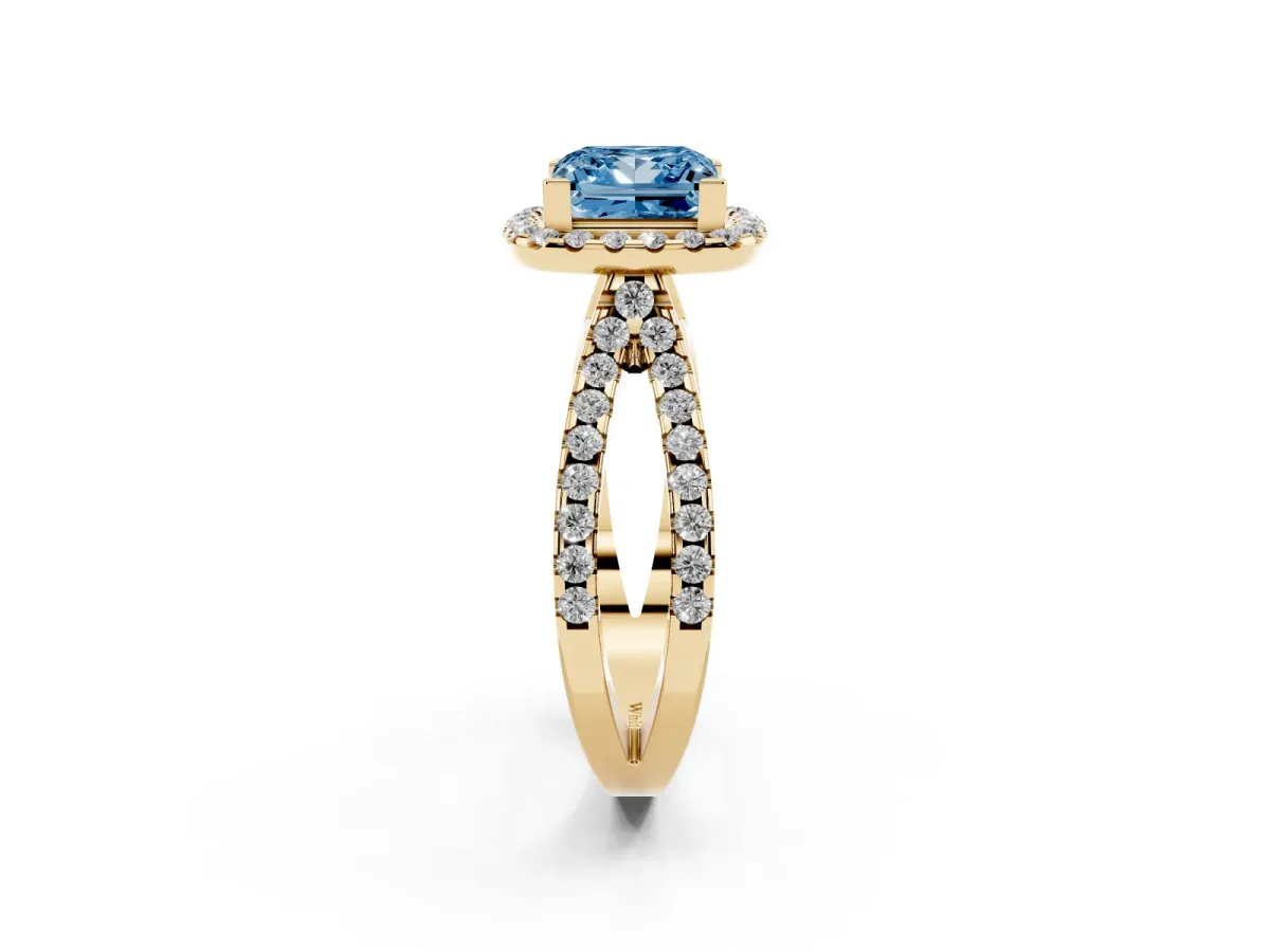 Fancy Blue Princess Cut Diamond Halo Ring with Split Shank Pavé Band and Prong Setting Yellow gold