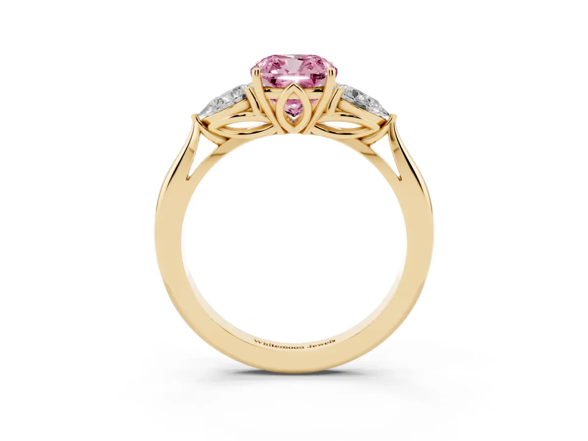 Fancy Pink Cushion Cut Diamond Three-Stone Ring with Pear Side Stones and Prong Setting Yellow gold