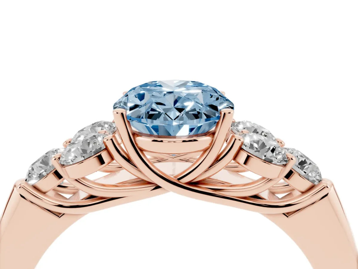 Fancy Blue Oval Cut Cut Diamond Cluster Ring with Round Accent Stones and Prong Setting on a Classic Band Rose gold