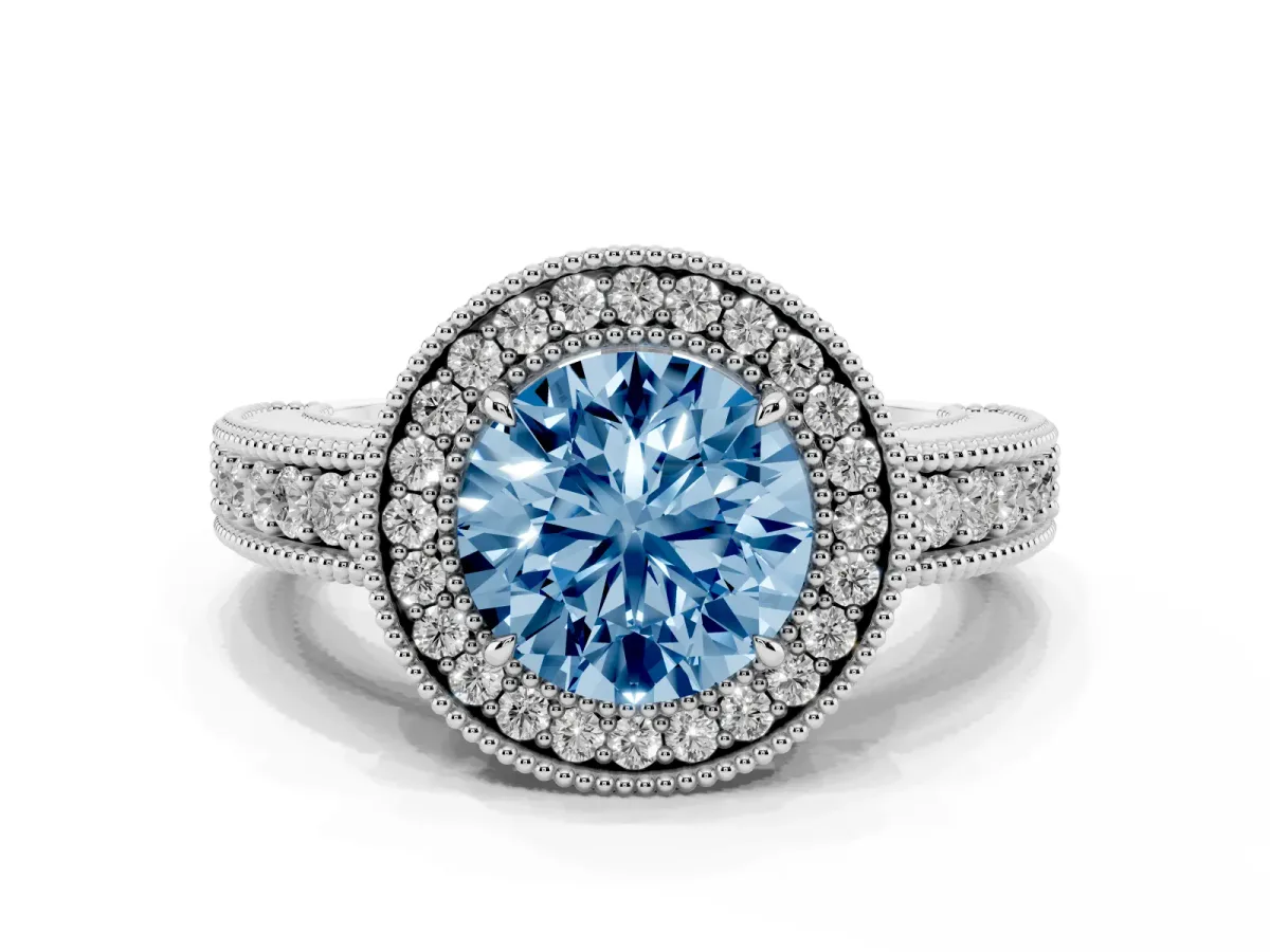Fancy Blue Round Cut Cut Halo Diamond Ring with Pavé Band and Four-Prong Setting Silver