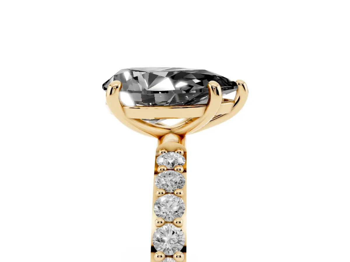 Fancy Black Pear Cut Diamond Solitaire Ring with Round Pavé Band and Prong Setting Yellow gold