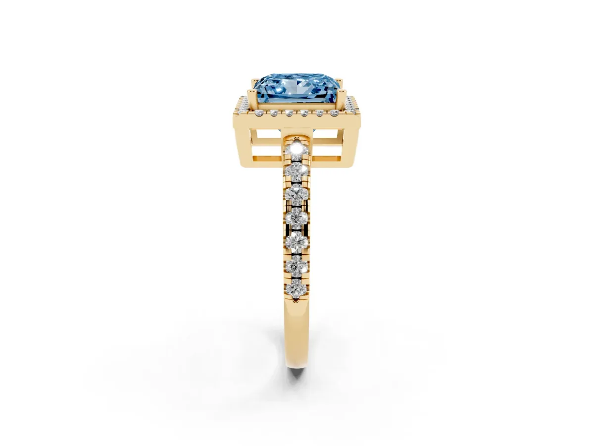 Fancy Blue Princess Cut Diamond Halo Ring with Pavé Band and Four-Prong Setting Yellow gold