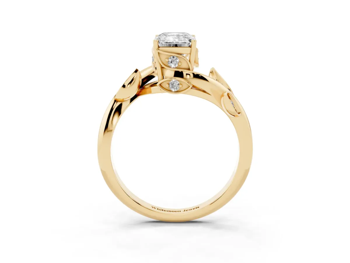 Emerald Cut Solitaire Twist Engagement Ring with Leaf Accents and Prong Setting Yellow gold