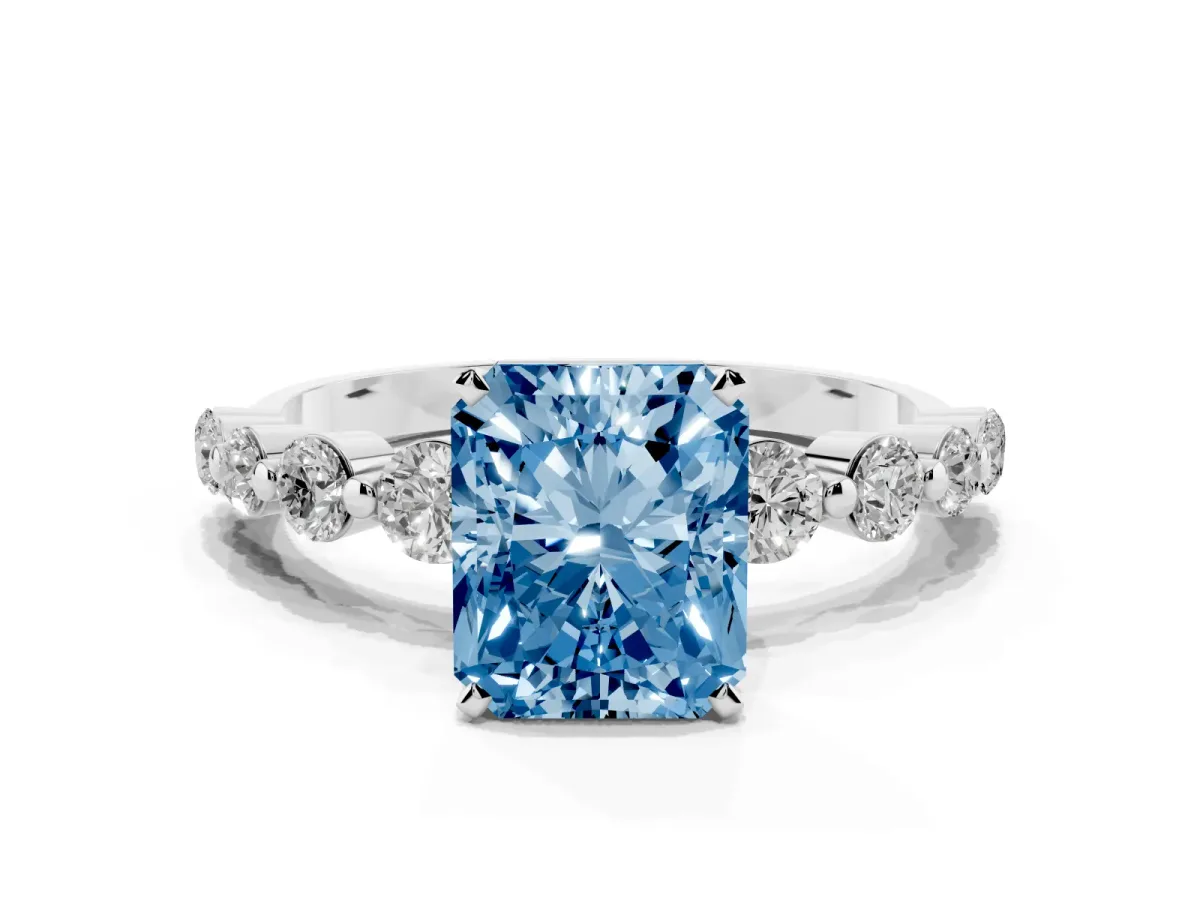 Fancy Blue Radiant Cut Solitaire Diamond Ring with Pave Band and Four-Prong Setting Silver