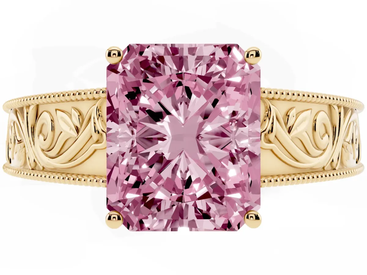 Fancy Pink Radiant Cut Diamond Solitaire Ring with Engraved Band and Four-Prong Setting Yellow gold