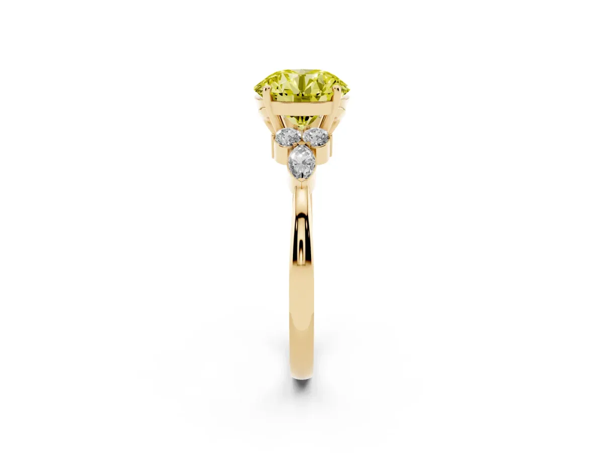 Fancy Yellow Round Cut Brilliant Diamond Solitaire Ring with Pear Side Stones and Four-Prong Setting Yellow gold