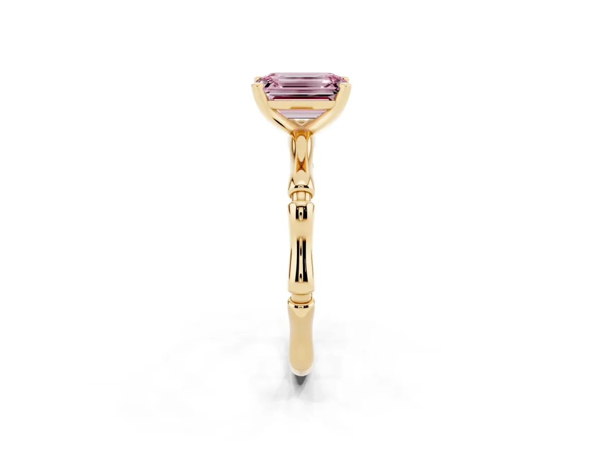 Fancy Pink Emerald Cut Solitaire Diamond Ring with Bamboo Band and Four-Prong Setting Yellow gold