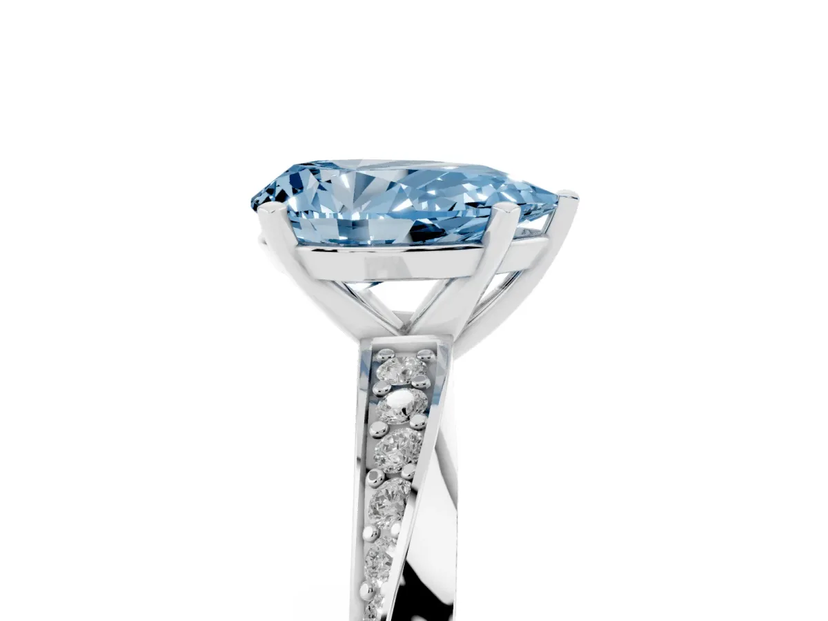 Fancy Blue Pear Cut Diamond Engagement Ring with Side Stone Accents and Four-Prong Setting Silver