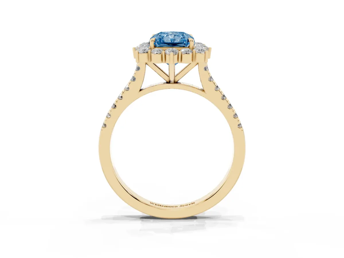 Fancy Blue Radiant Cut Halo Diamond Ring with Pavé Band and Prong Setting Yellow gold