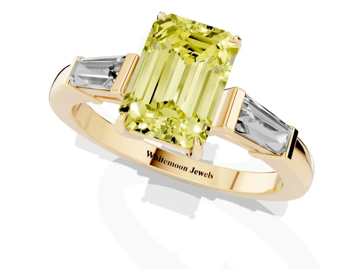 Fancy Yellow Emerald Cut Diamond Three-Stone Ring with Tapered Baguette Side Stones and Prong Setting Yellow gold
