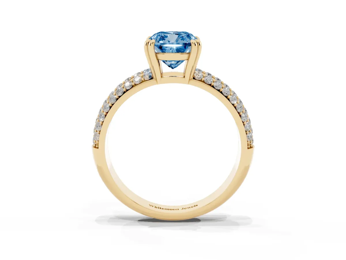 Fancy Blue Cushion Cut Diamond Solitaire Ring with Multi-Row Round Pavé Band and Prong Setting Yellow gold