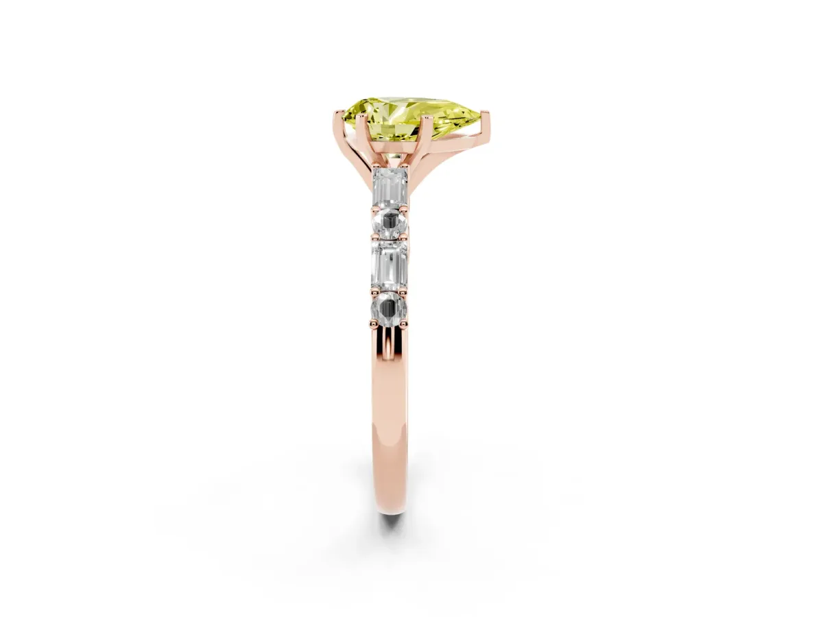 Fancy Yellow Pear Cut Diamond Solitaire with Side Baguettes and Channel Set Band Rose gold