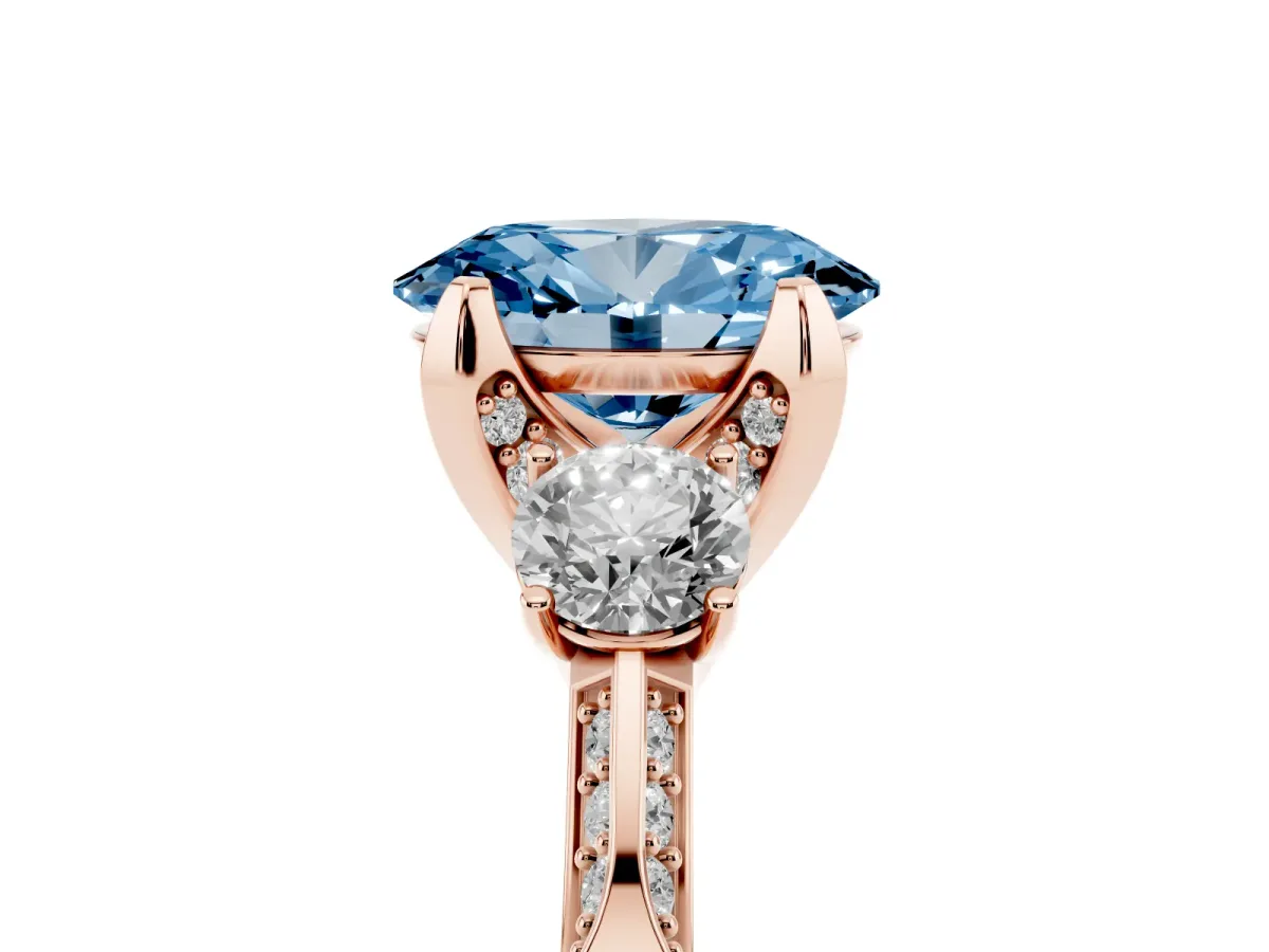 Fancy Blue Oval Cut Brilliant Three-Stone Diamond Ring with Pavé Band and Four-Prong Setting Rose gold