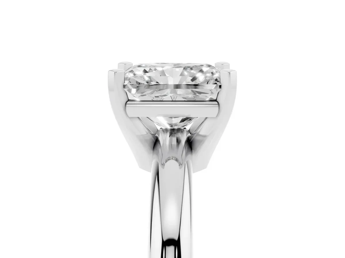 Radiant Cut Diamond Solitaire Engagement Ring with Round Band and Four-Prong Setting Silver