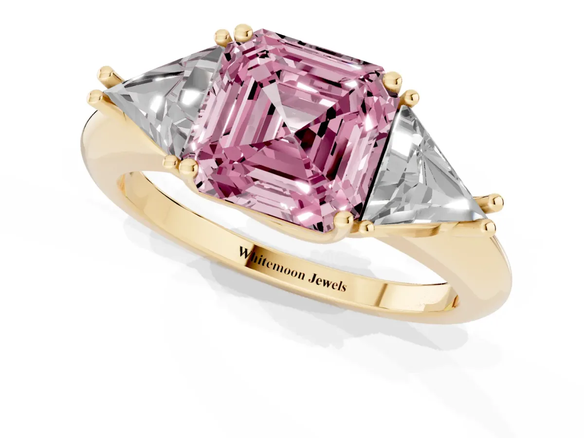 Fancy Pink Three-Stone Asscher Cut Diamond Engagement Ring with Trillion Side Stones and Prong Setting Yellow gold