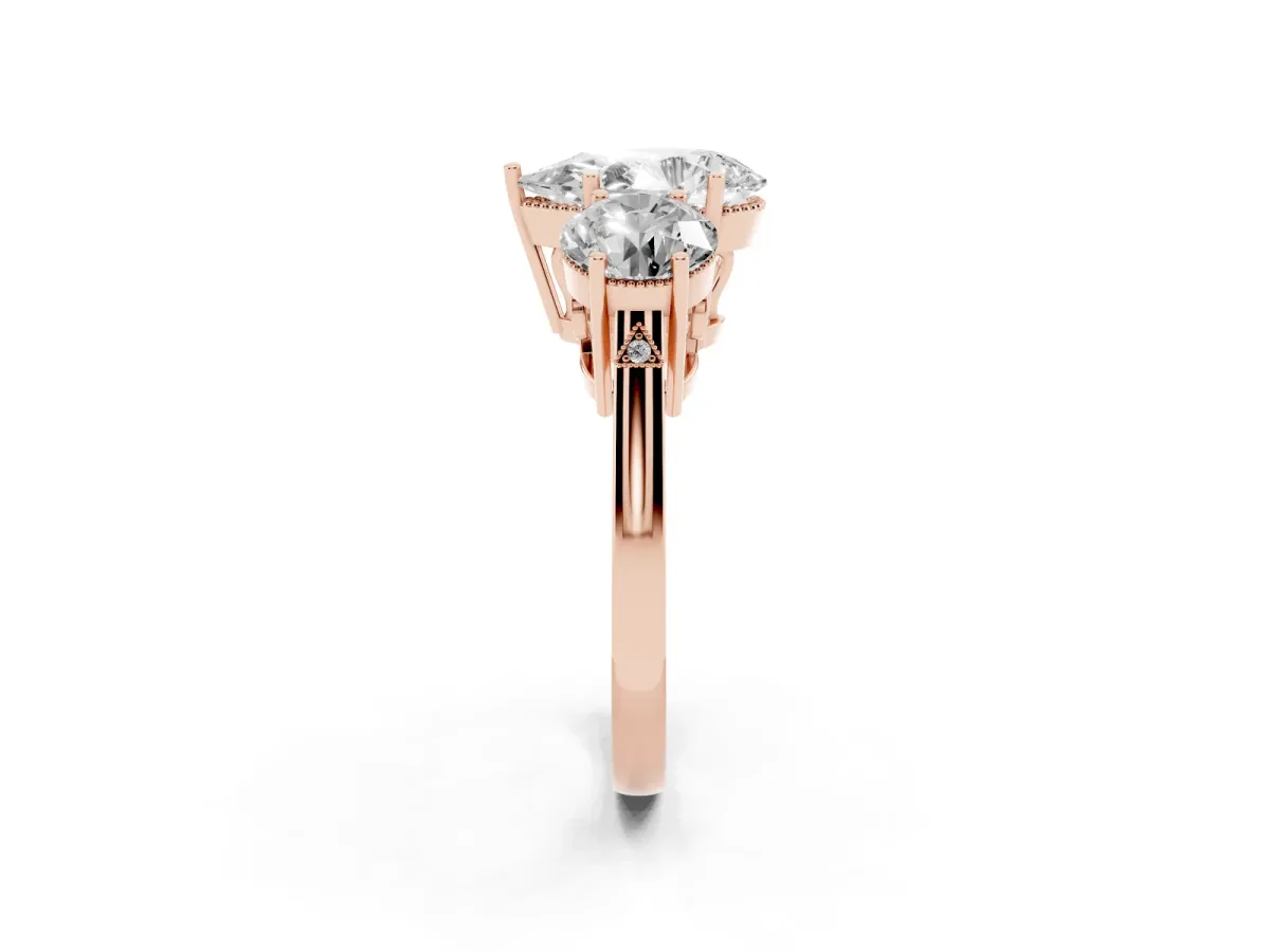 Three-Stone Pear Cut Diamond Engagement Ring with Prong Setting on a Classic Band Rose gold