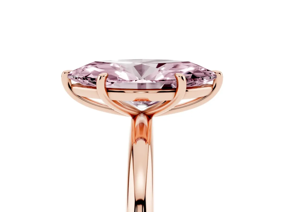 Fancy Pink Oval Cut Solitaire Diamond Ring with Four-Prong Setting on a Plain Band Rose gold