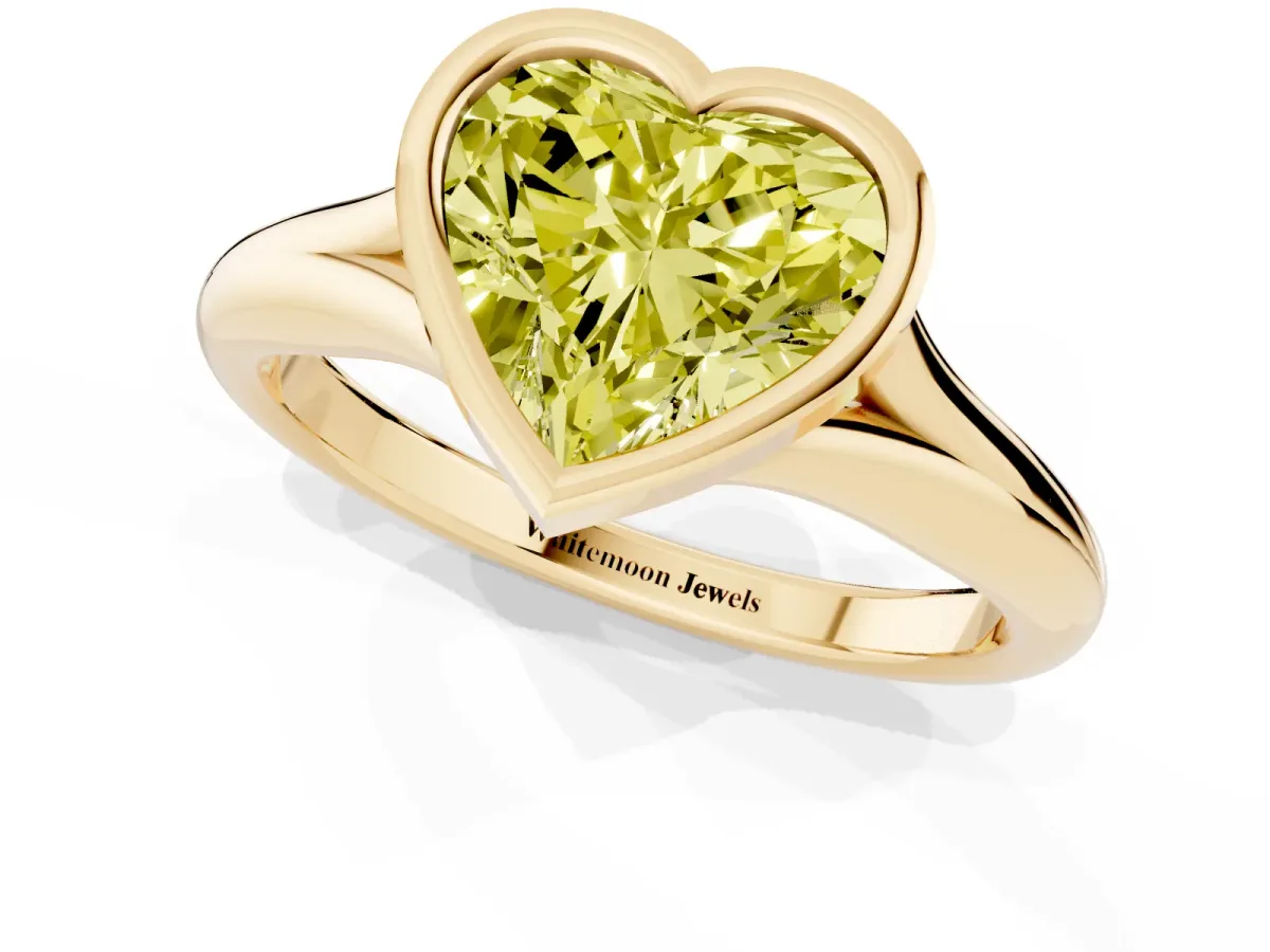 Fancy Yellow Bezel Set Heart Cut Solitaire Diamond Ring with Smooth Band Yellow gold