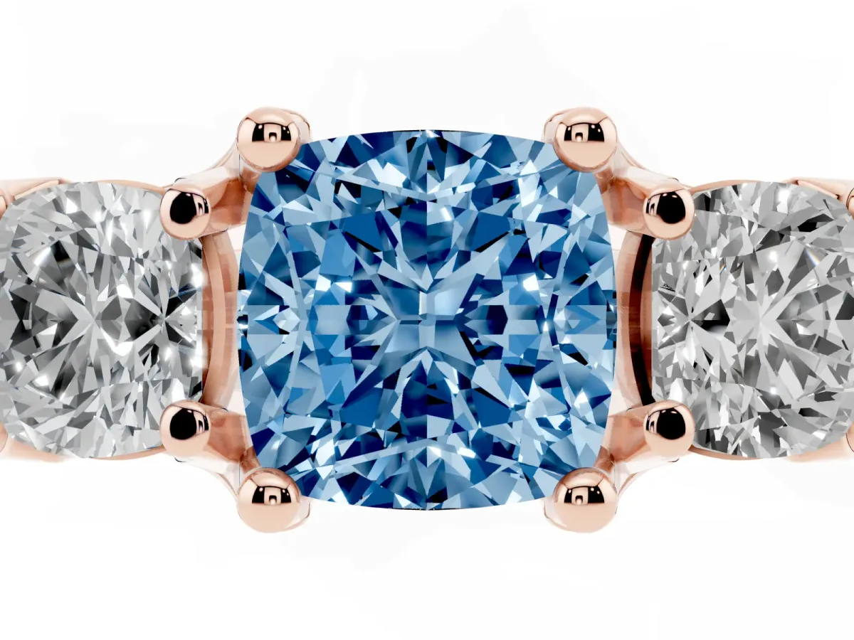 Fancy Blue Cushion Cut Diamond Three-Stone Ring with Channel Set Band and Four-Prong Setting Rose gold