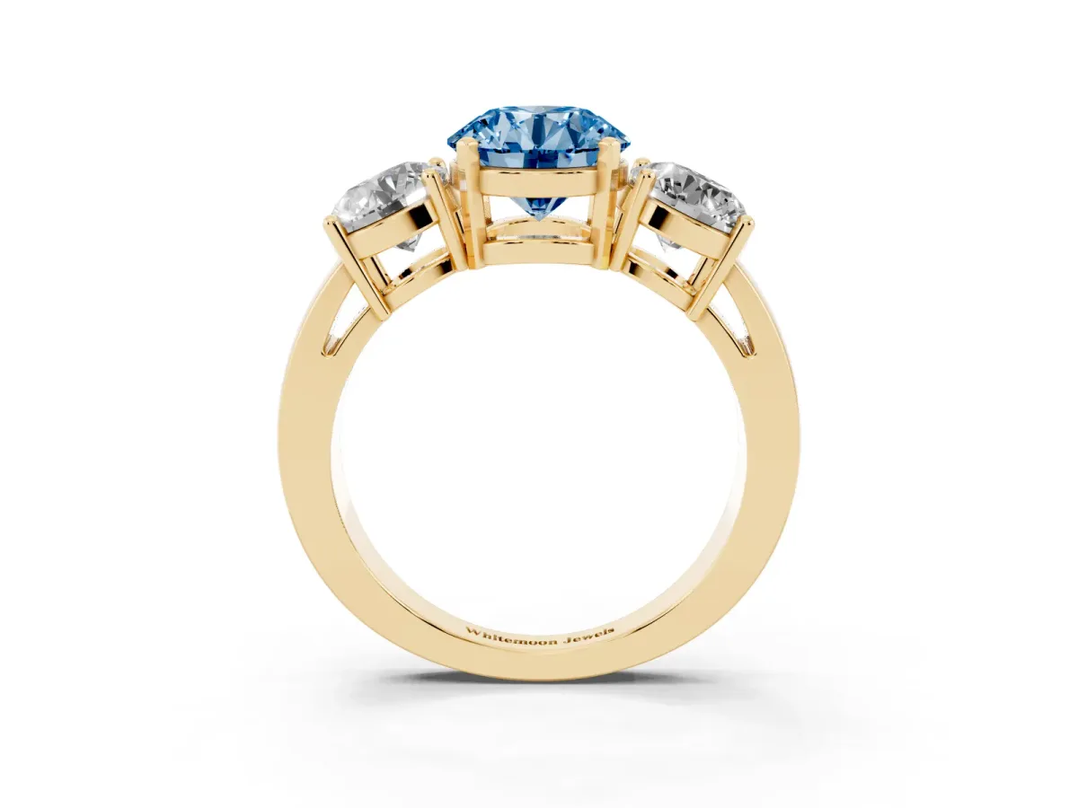 Fancy Blue Three-Stone Round Cut Diamond Ring with Round Side Stones, Classic Band, and Four-Prong Setting Yellow gold
